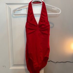 red body suit/leotard